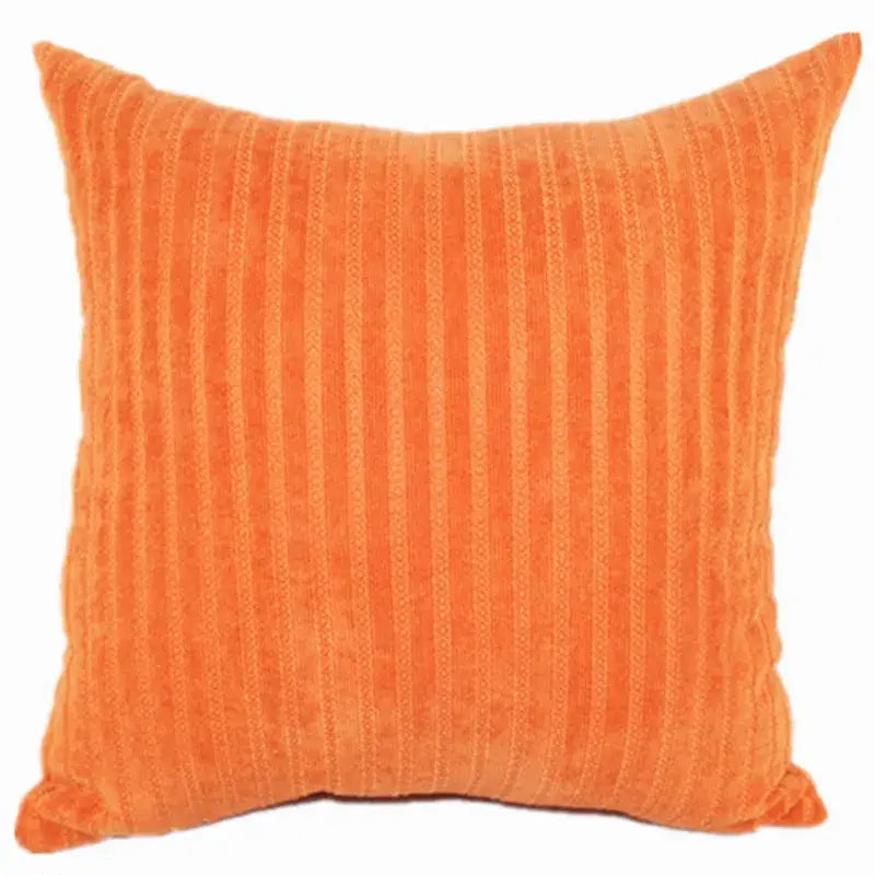 Vibrant orange decorbites corduroy pillow with distinct vertical ribs complementing pink and blue striped pillow cover decor