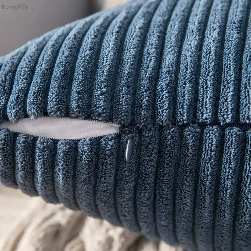 Blue corduroy pillow with visible zipper and white lining from decorbites corduroy pillow cover collection for living room decor