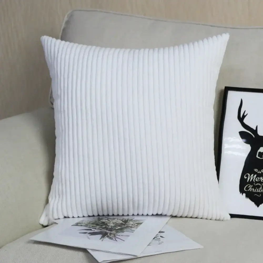 White corduroy throw pillow with vertical ribbed texture featured in decorbites corduroy pillow cover collection