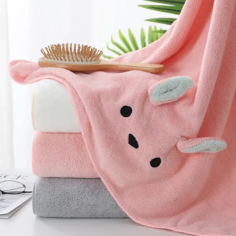 Pink plush face towel with embroidered bunny face and light blue ears for decorbites cartoon soft hand use