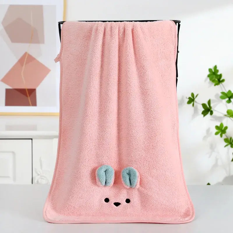 Pink bunny face towel with soft plush texture and light blue embroidered ears for decorbites cartoon soft hand use