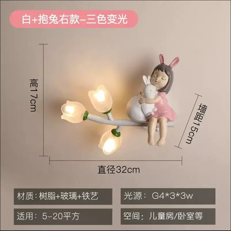 Whimsical white resin wall lamp with a sleeping girl in pink dress and bunny ears hugging a plush rabbit, decorbites kids room led