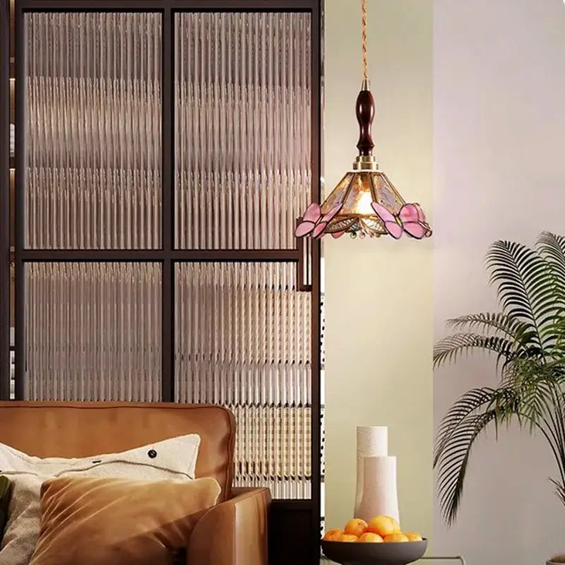 Delicate pink butterfly glass led pendant light with brass accents and dark wood finial for bedroom decorbites butterfly glass
