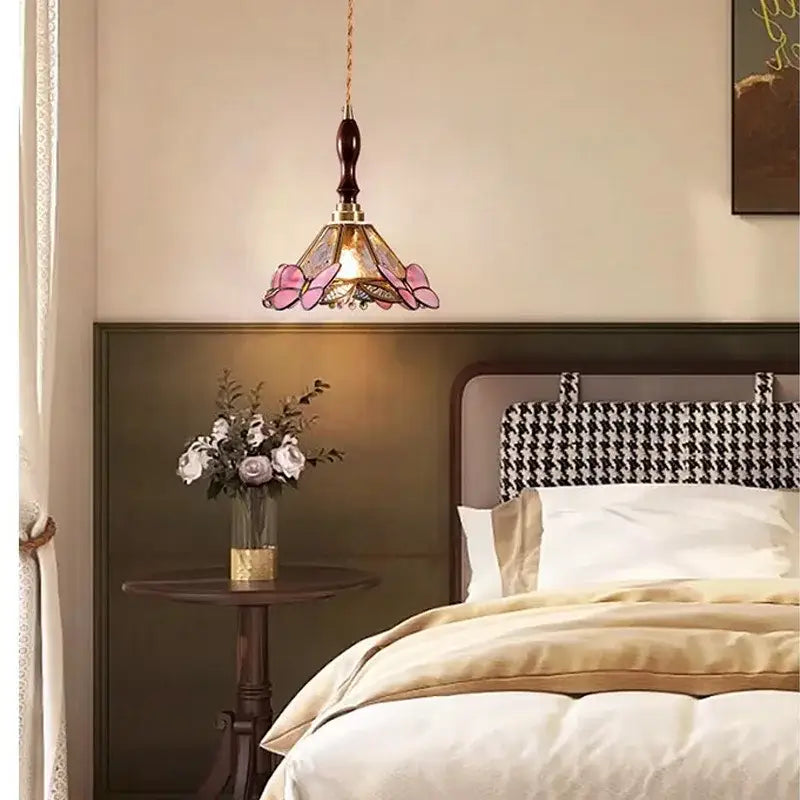 Pink butterfly glass led pendant light with delicate stained glass, dark wood finial, and brass accents for bedroom decorbites butterfly glass