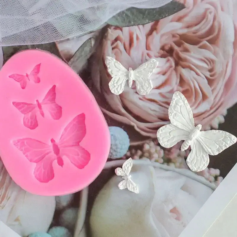 Pink butterfly silicone fondant mold with three embossed butterfly designs for cake decorating by decorbites butterfly silicone