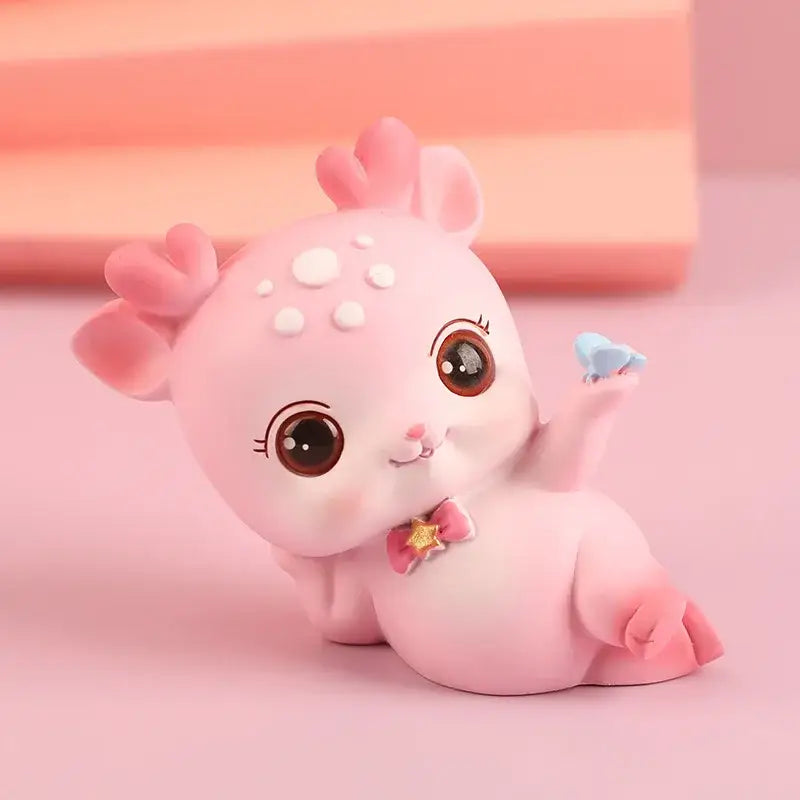 Pink cartoon deer resin figurines featuring white spots brown eyes and pink bow with gold star for decorbites decorbites cartoon deer