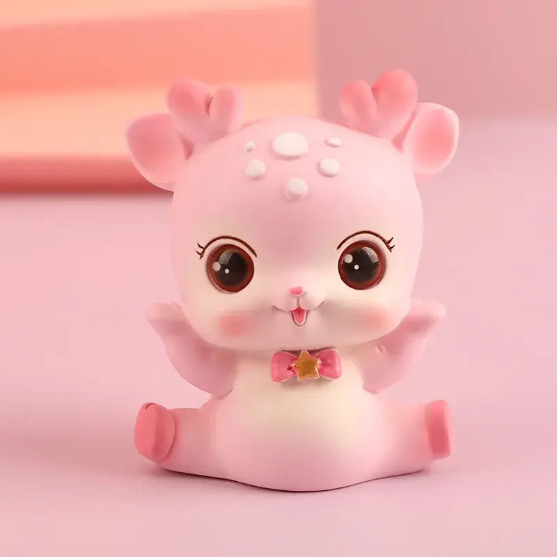 Pink cartoon deer resin figurine with white spots, large brown eyes, and pink bow with gold star for bedroom decorbites decor