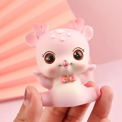 Pink cartoon deer resin figurines featuring a cute deer with large brown eyes and tiny antlers for bedroom decorbites decor