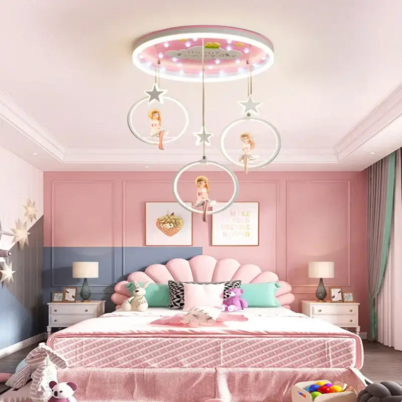 Pink cartoon princess kids room chandelier with led ring and hanging doll figures in white hoops for decorbites cartoon princess decor
