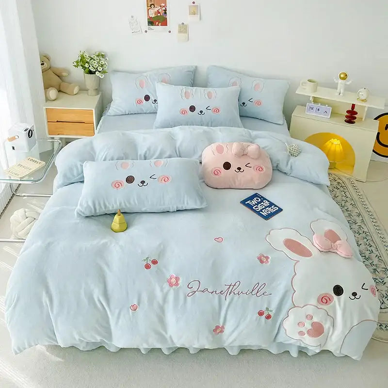 Light blue bunny-themed bedding set with soft plush fabric and embroidered decorbites cartoon rabbit applique details