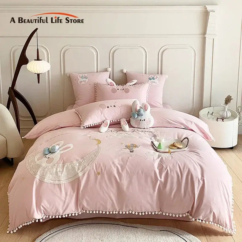 Pink cartoon rabbit moon cotton bedding set with embroidered details and pom pom trim by decorbites cartoon rabbit