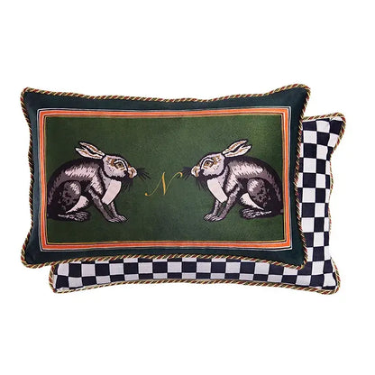 Dark green velvet rectangular pillow with embroidered rabbits and gold monogram framed by orange braided trim decorbites cat print velvet throw