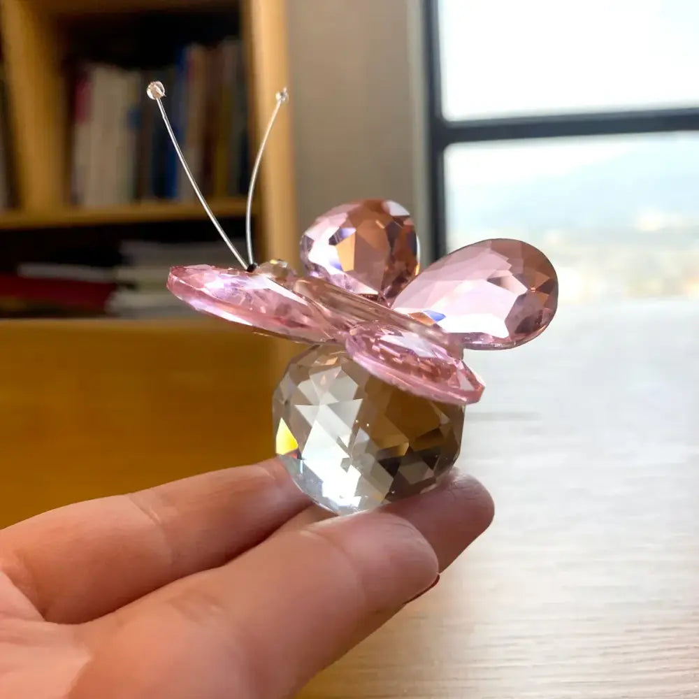 Delicate pink and clear crystal butterfly figurine with faceted wings and slender antennae for bedroom decorbites decor