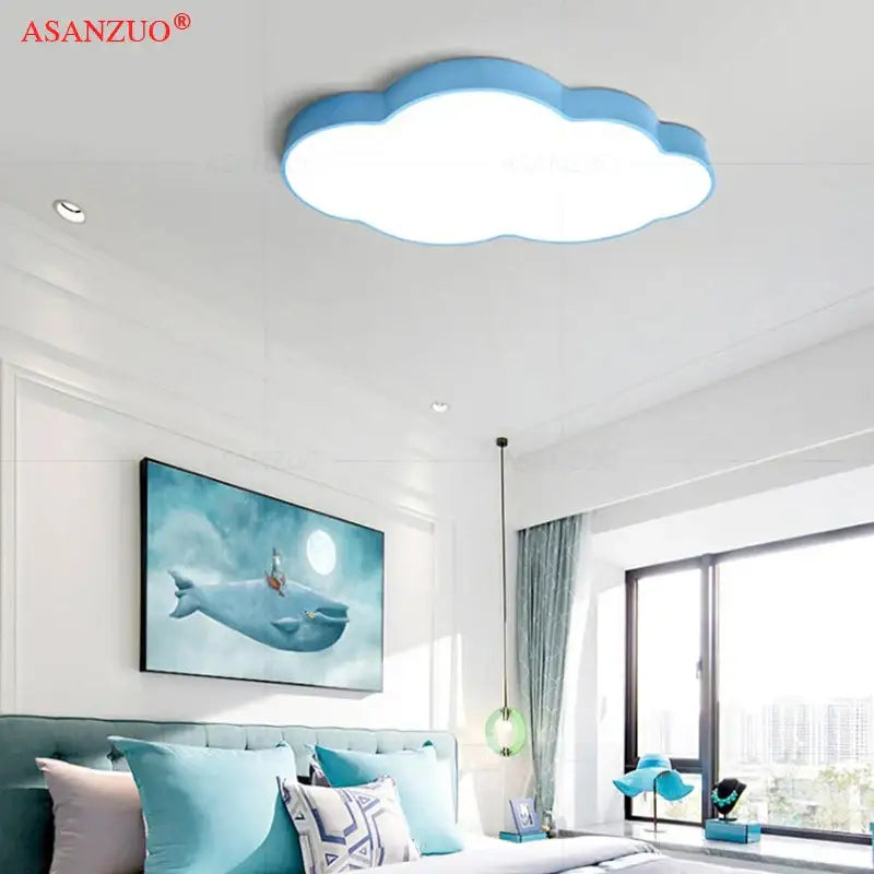 Blue cloud-shaped ceiling light fixture from decorbites cloud led kids collection for bedroom decor