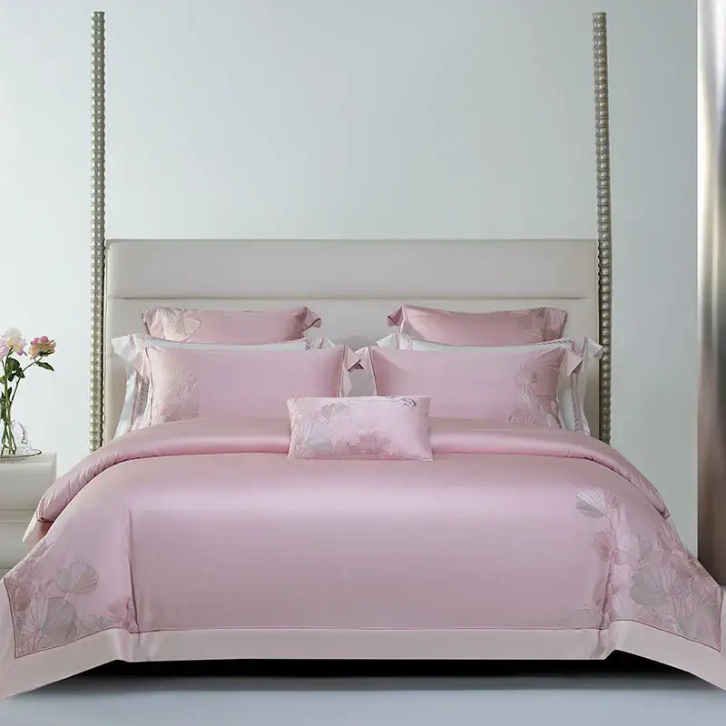 Pink satin bedding set with delicate cotton flowers embroidery and satin finish for elegant bedroom decorbites decor