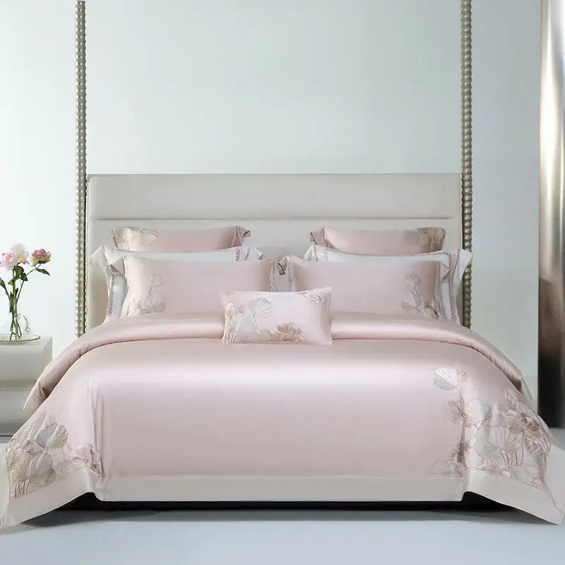 Pink satin bedding set with delicate decorbites cotton flowers embroidery in matching tones for bedroom decor