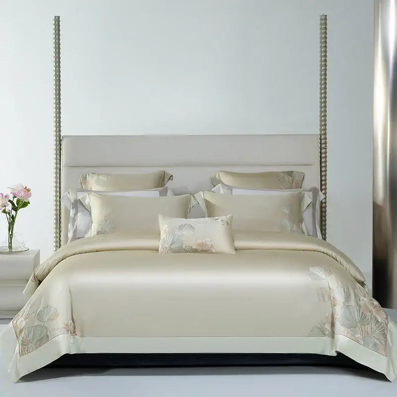 Cream-colored satin bedding set with delicate cotton flowers embroidery for elegant decorbites bedroom decor