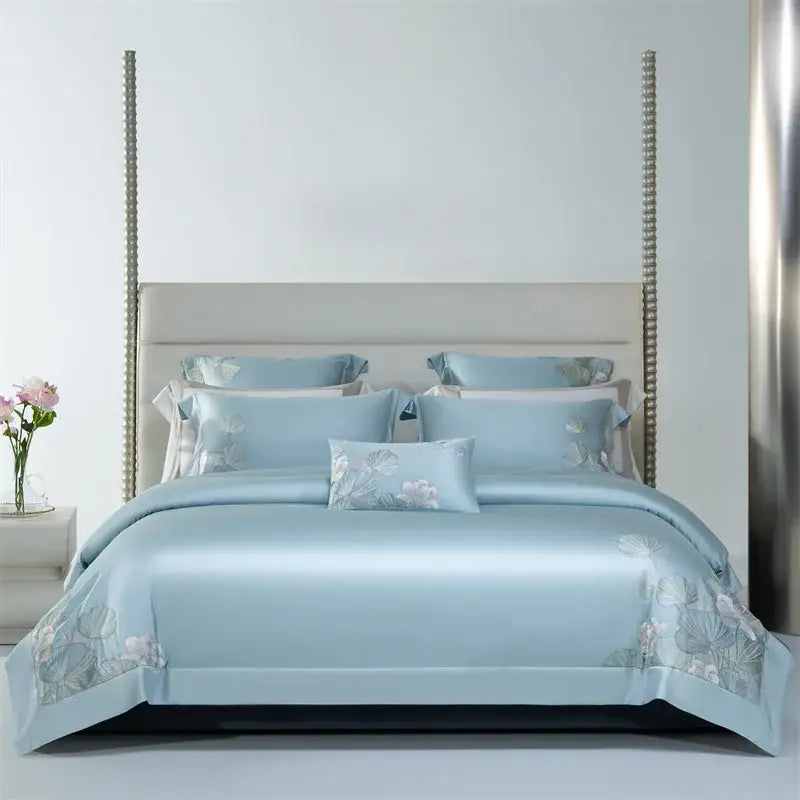 Light blue satin bedding set with soft white and pale pink decorbites cotton flowers embroidery design