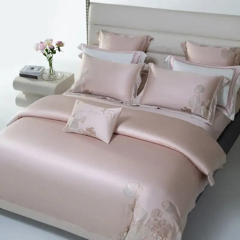 Pink satin bedding set with soft blush decorbites cotton flowers embroidery in muted gold and gray tones