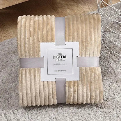 Beige corduroy throw blanket with soft ribbed texture and central label in decorbites cozy striped flannel fleece bedroom throw