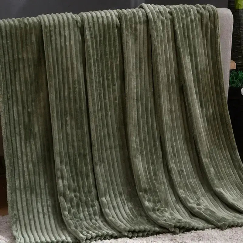 A plush olive green corduroy throw blanket with a soft ribbed pattern for decorbites cozy striped flannel fleece decor
