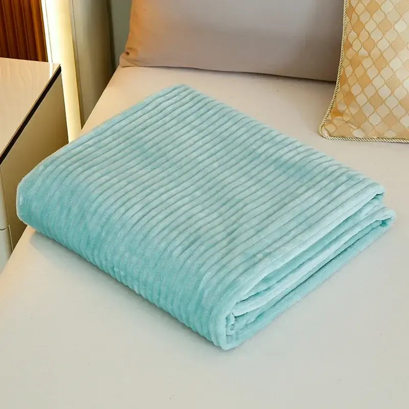 A soft light blue corduroy throw blanket with plush texture and vertical ridges for decorbites cozy striped flannel fleece decor