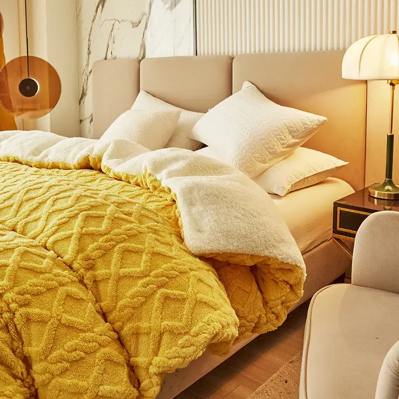Vibrant yellow fleece comforter with plush white sherpa lining paired with pink diamond cashmere duvet cover decorbites dual