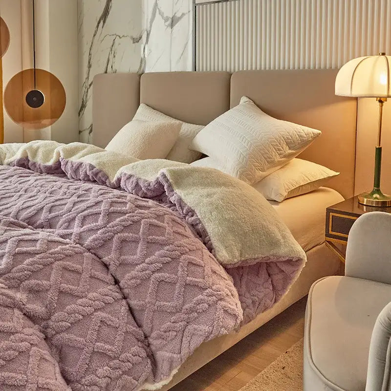 A plush lavender fleece blanket with white lining and diamond pattern from decorbites dual cashmere duvet cover set