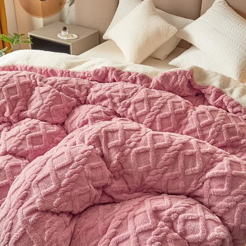 Pink plush throw blanket with textured diamond pattern complements decorbites dual cashmere duvet cover in bedroom decor