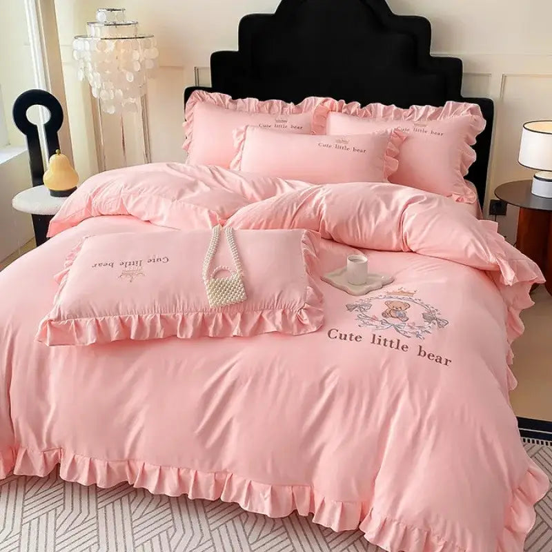 Pink embroidered bear cotton bed skirt set with ruffled satin-like fabric and cute little bear design