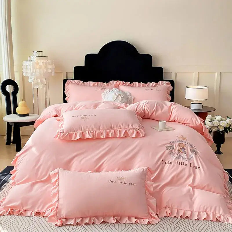 Pink embroidered bear cotton bed skirt set with ruffled edges and cute little bear design in satin fabric