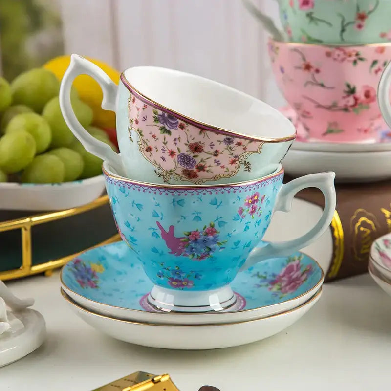 A delicate blue porcelain flower tea cup with pink floral patterns and matching saucer in a phnom penh afternoon set