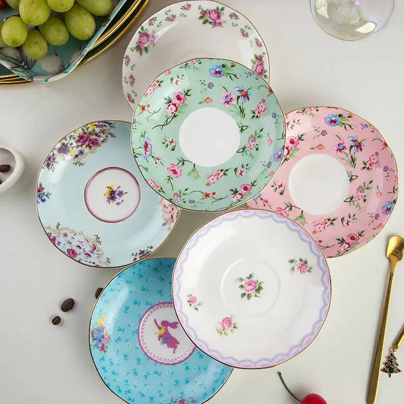 Pastel-colored floral bone china saucers with gold rims and hand-painted roses for phnom penh afternoon flower tea cup set