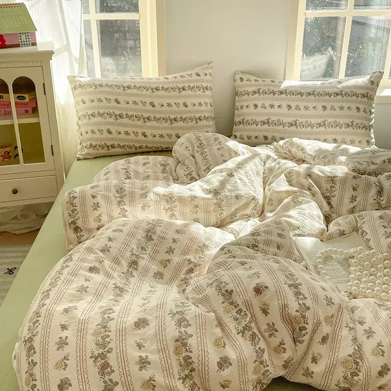 Cream-colored floral double layer yarn bedspread set with delicate green and beige patterns in soft cotton fabric