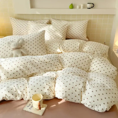 Cream-colored quilted bedspread set with dark gray heart pattern featuring double layer yarn material for bedrooms