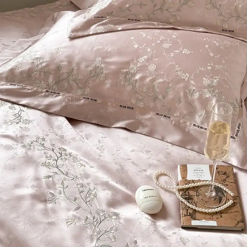 Pink satin pillowcases with silver floral embroidery and subtle miu miu label in egyptian cotton bedding set decorbites jacquard 100s