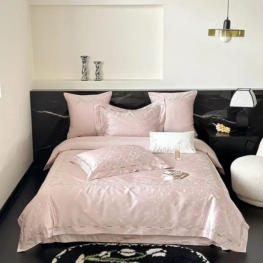 Pink satin bedding set with subtle floral embroidery made from egyptian cotton decorbites jacquard 100s fabric