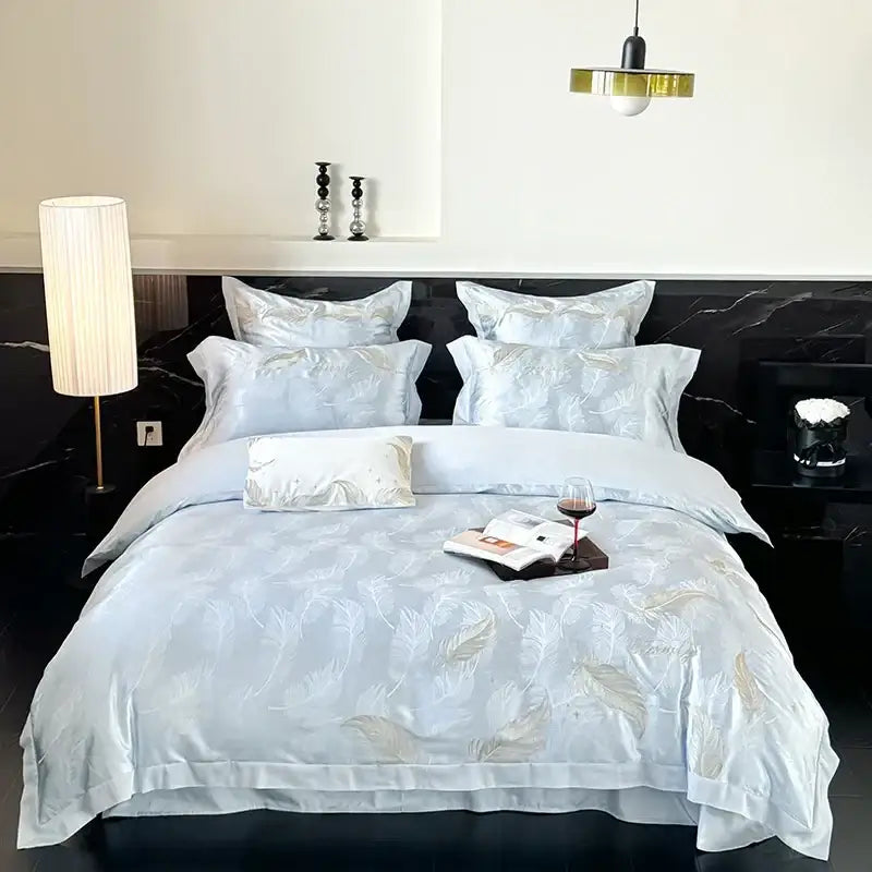 Light blue satin duvet cover set with gold feather embroidery paired with pink floral egyptian cotton bedding set decorbites jacquard 100s