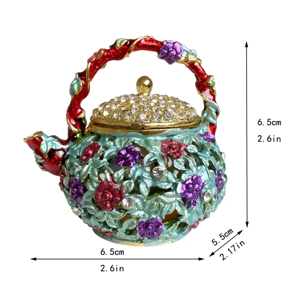Pink floral heart jewelry trinket box shaped like a turquoise enamel teapot storage case with rhinestones and gold hardware