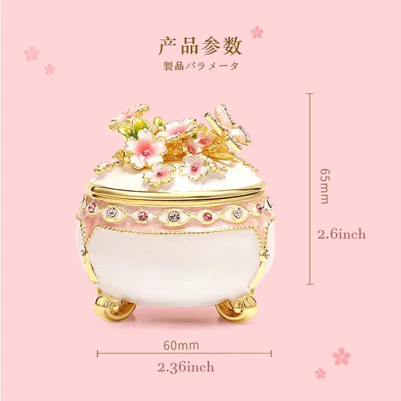 Delicate white enamel jewelry trinket box with gold accents and pink cherry blossoms for bedroom storage case