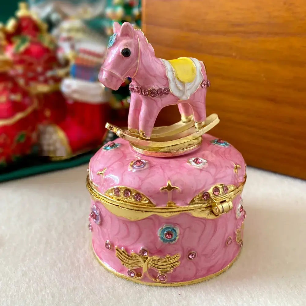 Pink enamel rocking horse jewelry trinket box with gold accents and rhinestones storage case for bedroom use