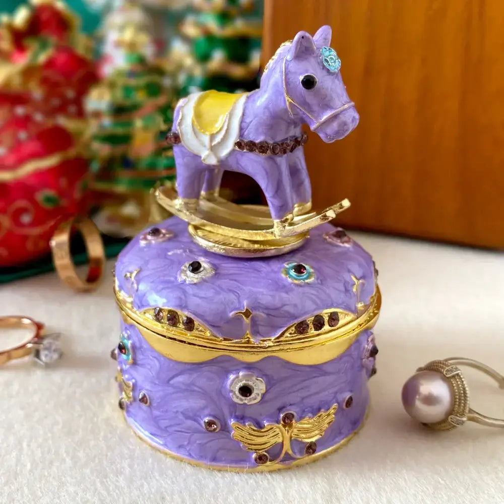 Purple rocking horse-themed jewelry trinket box with gold accents and rhinestones for bedroom storage case