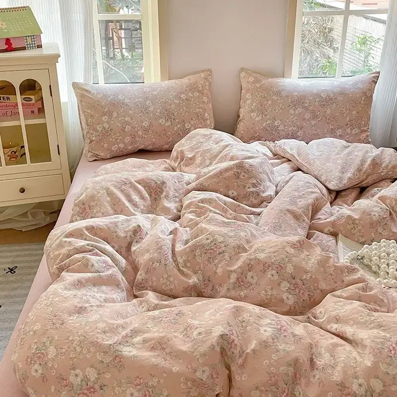 Pink floral jacquard fitted sheet set with soft textured yarn fabric for comfortable bedroom use