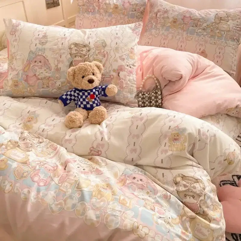 A plush beige teddy bear wearing a blue white checkered shirt with a red heart on the chest in a decorbites cozy cartoon printed comforter set