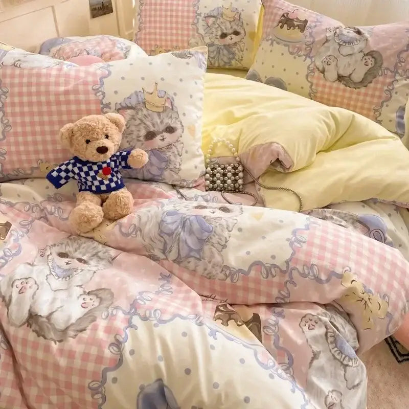 Pastel pink and cream cat-themed cotton comforter set with floral lace embroidery and cozy cartoon printed fabric