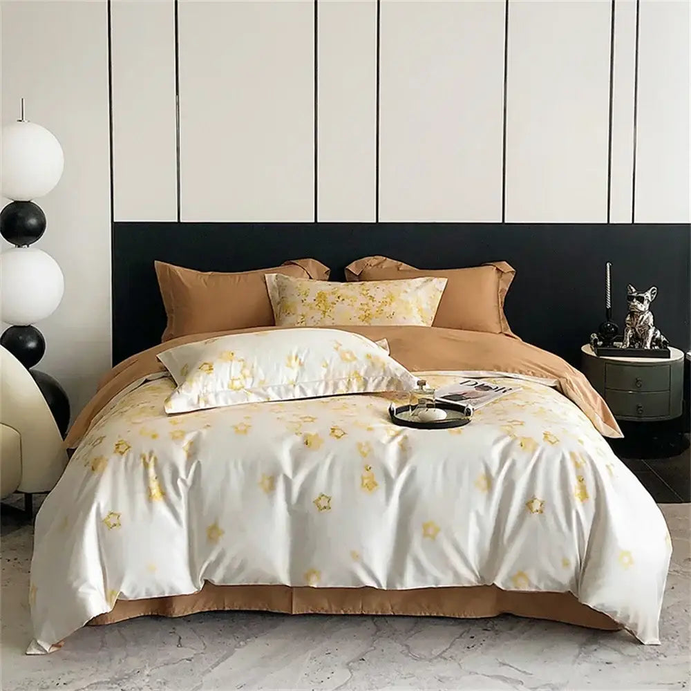 White duvet cover with gold star embroidery and tan pillowcases in pink floral colorful egyptian cotton bedding set decorbites
