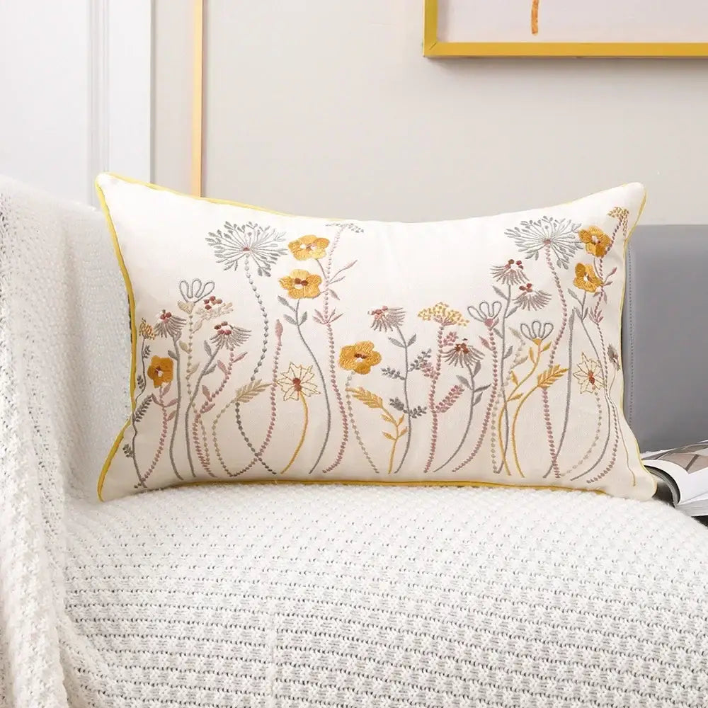 Cream embroidered living room cushion cover with pink flower farmhouse design and yellow piping trim from decorbites 3d pink