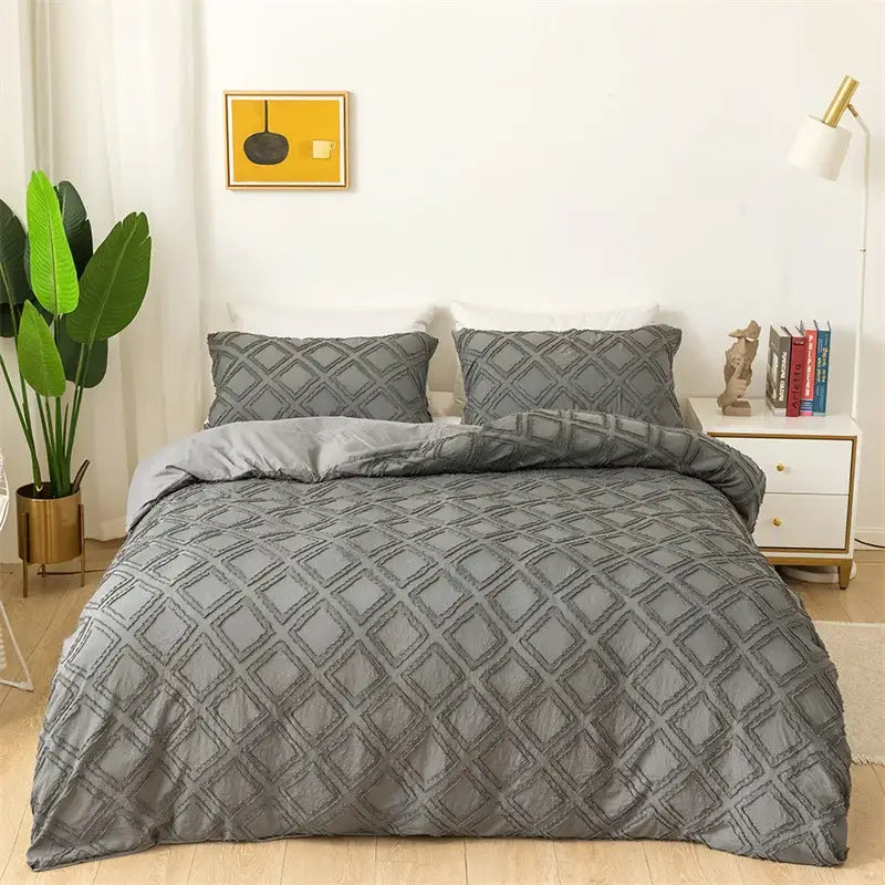 Gray quilted bedding set with diamond pattern complementing decorbites geometric cut flowers duvet cover design