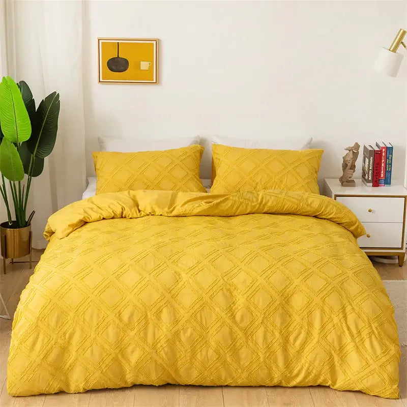 Vibrant yellow quilted duvet set with geometric cut flowers pattern from decorbites bedding set for bedroom decor