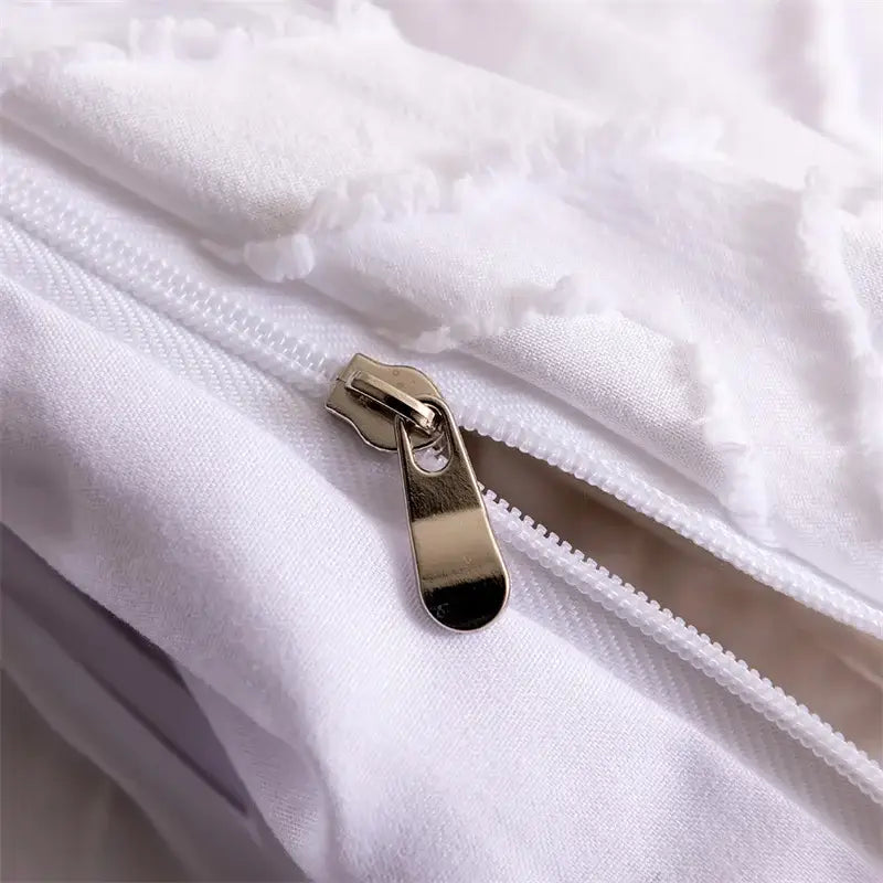 White textured fabric with metallic gold zipper pull on pink geometric cut flowers quilted bedding set by decorbites